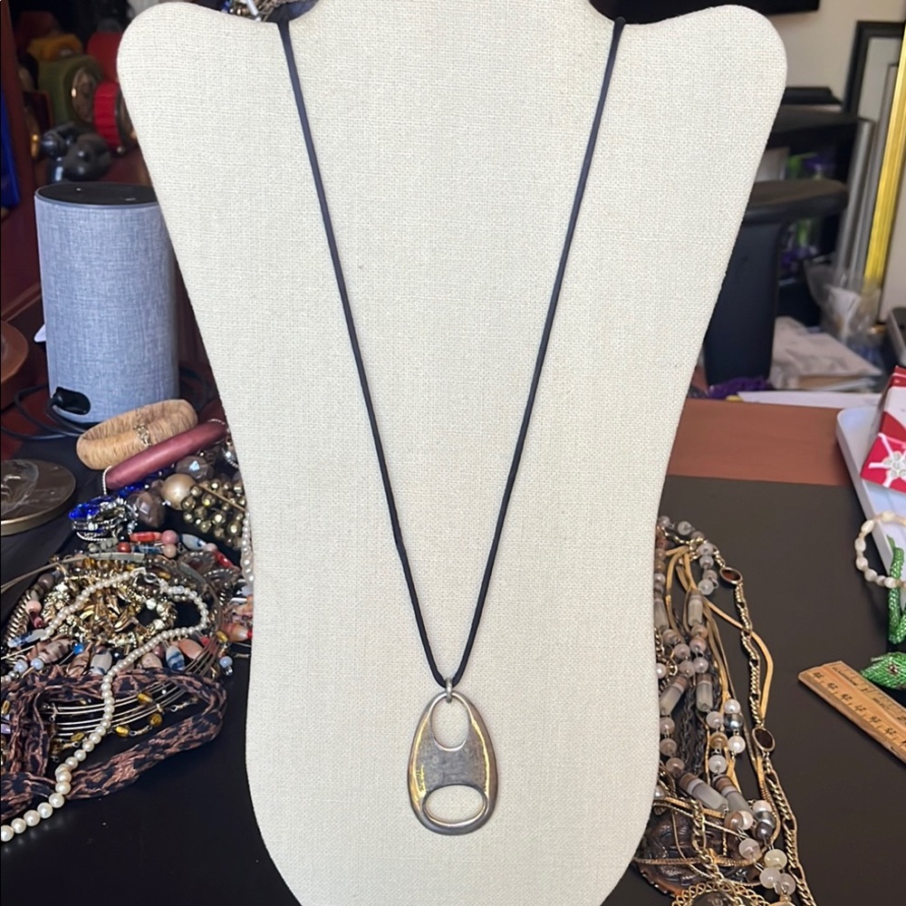 Freeform Silver Pendant Necklace on black silk strap